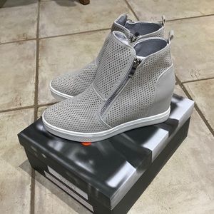 Brand new Ccocci light grey wedge sneakers.